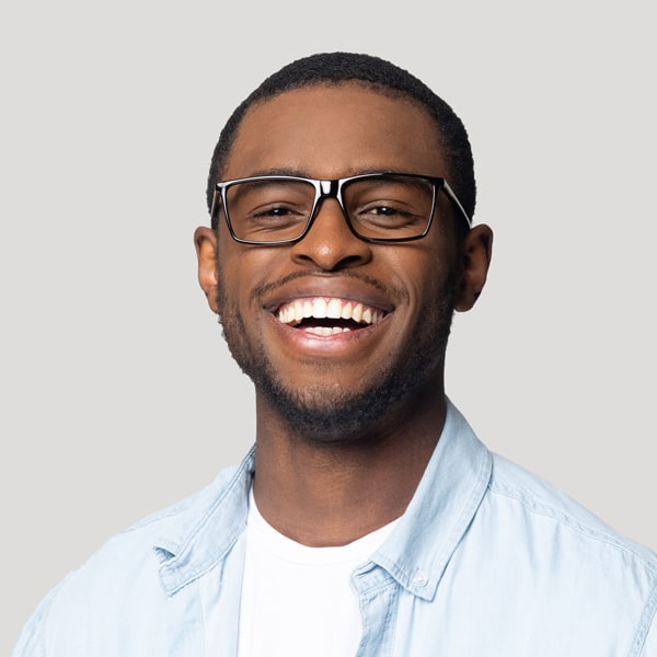 smiling man with good teeth.